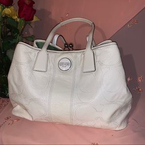 Used vintage women’s Coach handbag